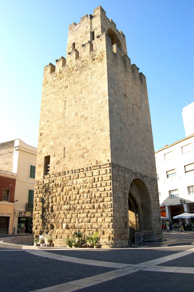 Image: Aragonese tower in Oristano near the statue of Eleonora d'Arborea.