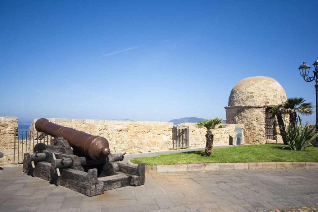 Image: Walking along the bastions is one of the best things to do in Alghero, Sardinia.